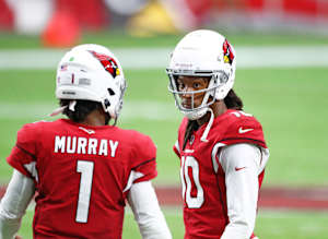 Arizona Cardinals quarterback Kyler Murray (1) with wide receiver DeAndre Hopkins (10) against the Washington Football Team at State Farm Stadium.